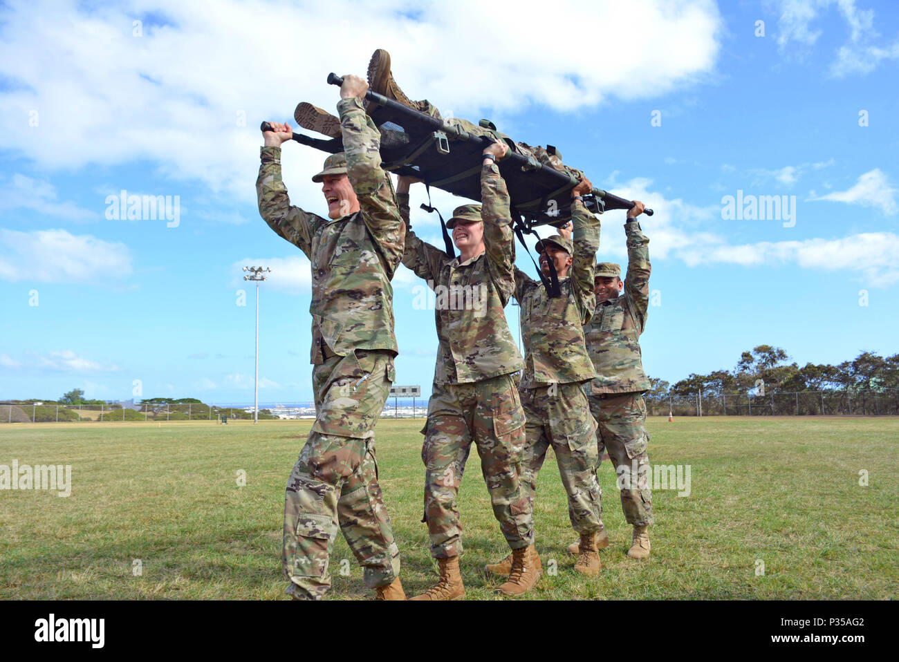 U.S. Army Soldiers at Tripler Army Medical Center practice evacuating a ...