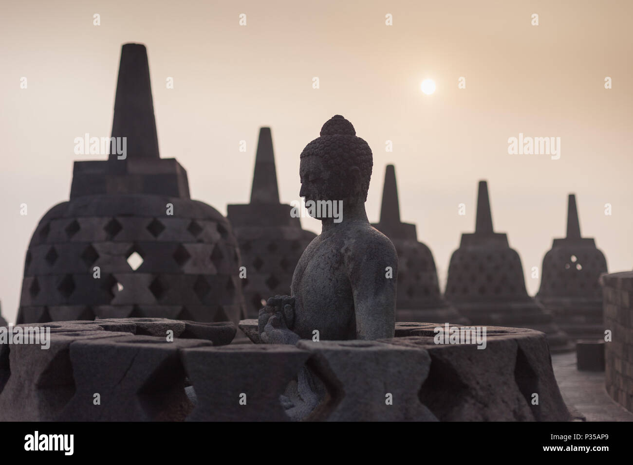 Buddha statue at Borobudur Temple, Java, Indonesia Stock Photo - Alamy