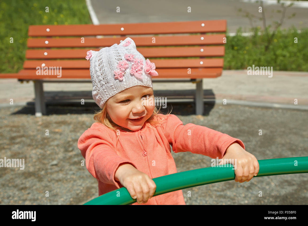 little girl on playground Stock Photo - Alamy