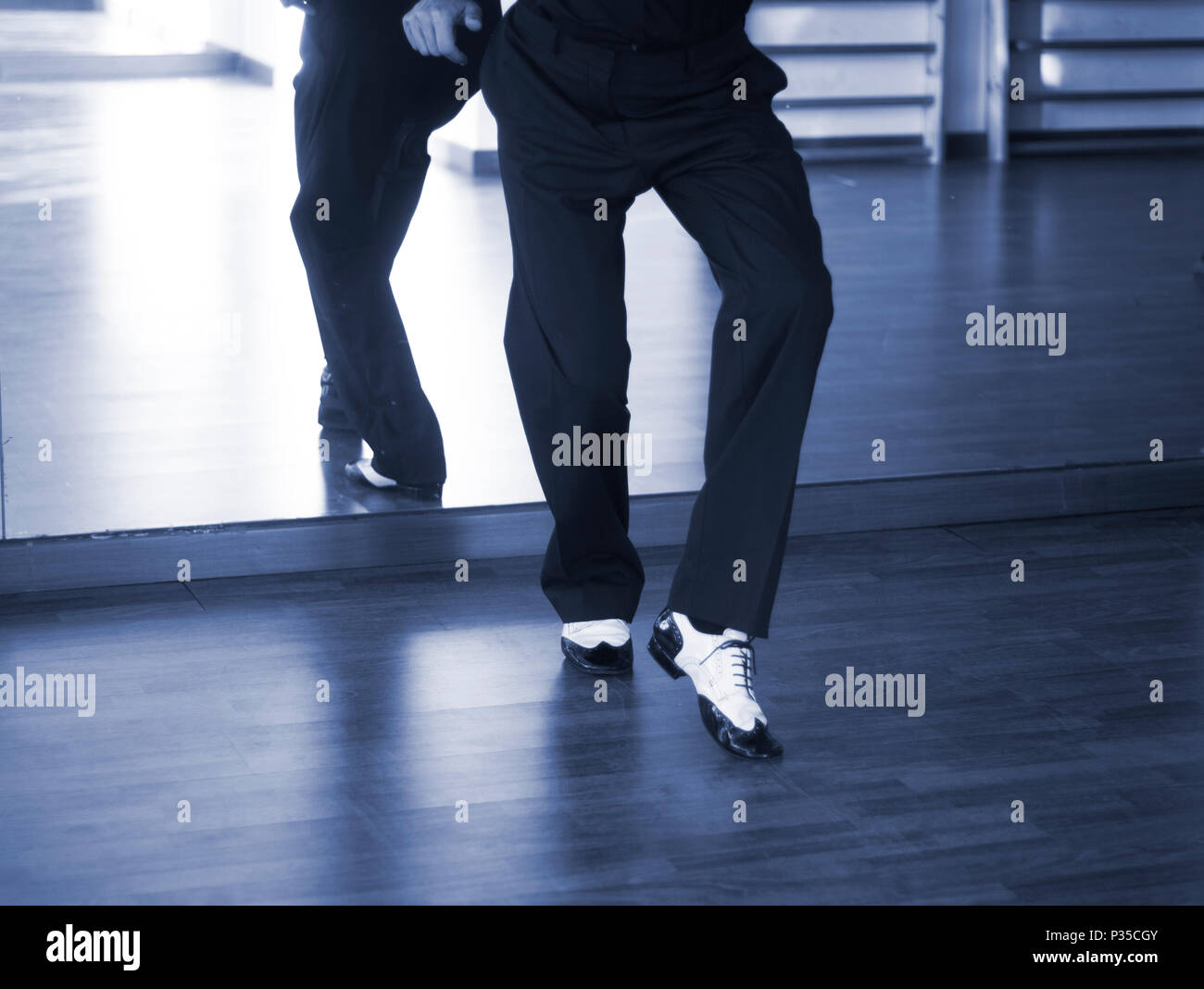 Male ballroom dance salsa dancer instructors man dancing in shcool