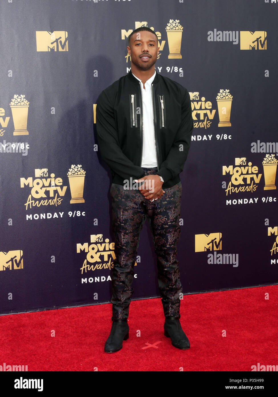 Michael B. Jordan attending the 2018 MTV Movie and TV Awards held at the  Barker Hangar in Los Angeles, USA Stock Photo - Alamy