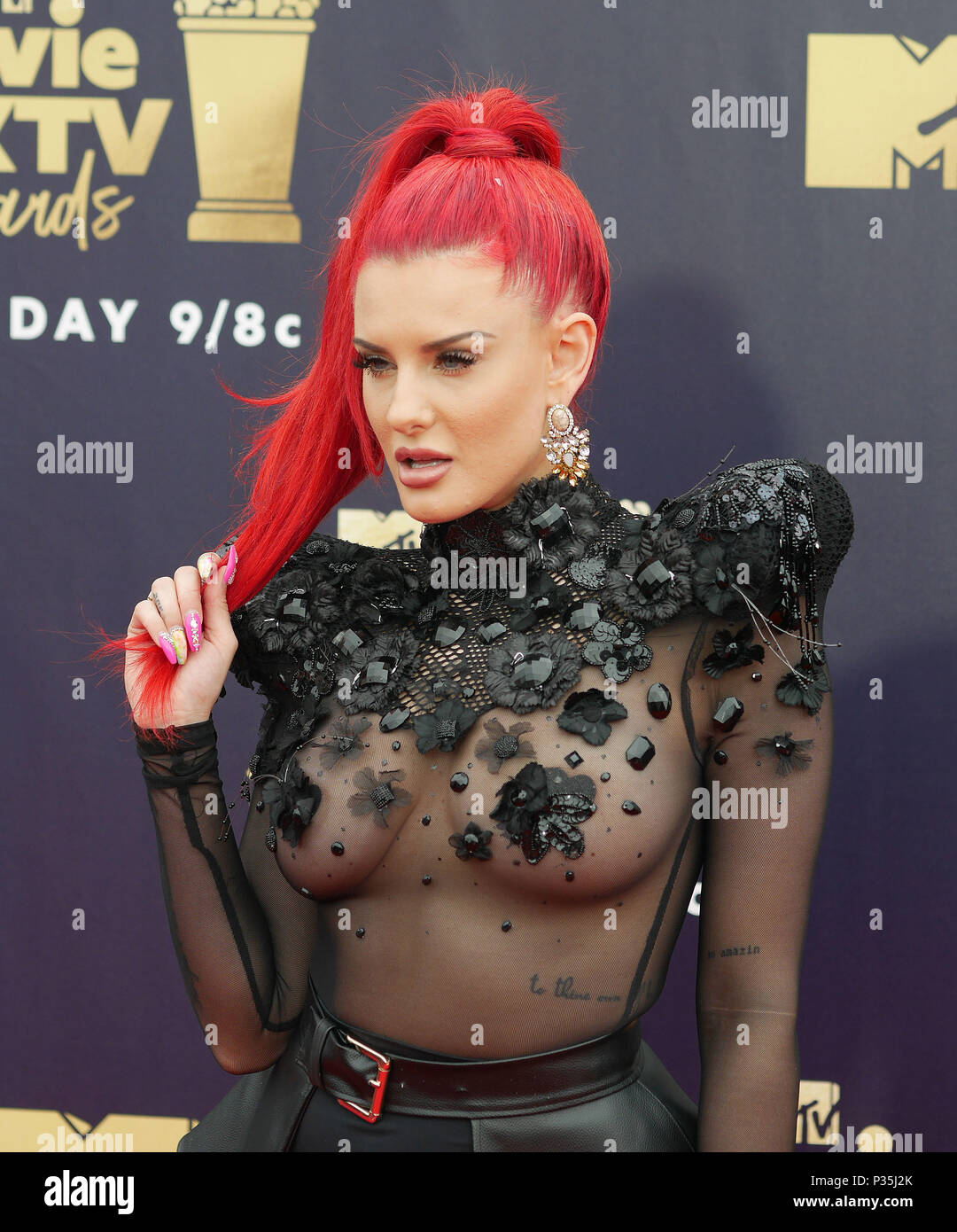 Justina Valentine attending the 2018 MTV Movie and TV Awards held at the Barker Hangar in Los Angeles, USA. Stock Photo