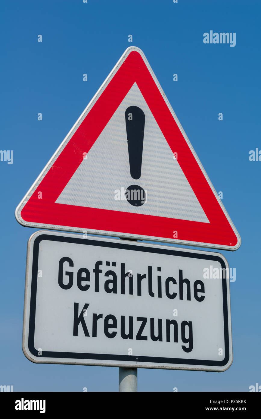 Traffic sign 'Dangerous crossing', Ostrfriesland, Lower Saxony, Germany Stock Photo