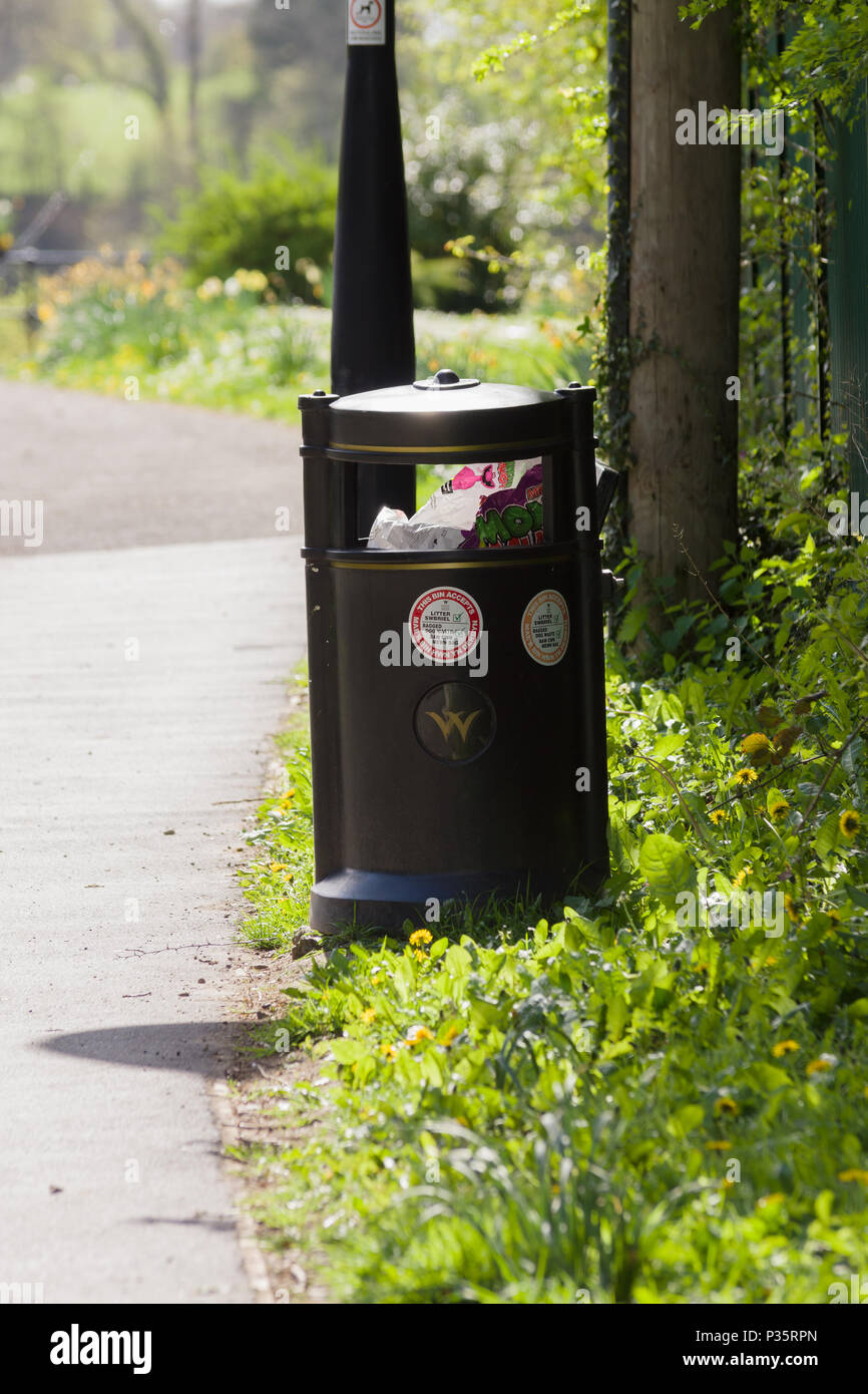 General waste litter bin installed in Wrexham North Wales with stickers