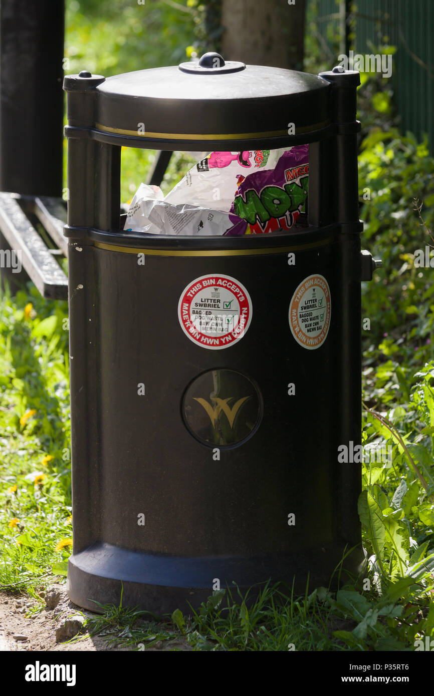 General waste litter bin installed in Wrexham North Wales with stickers