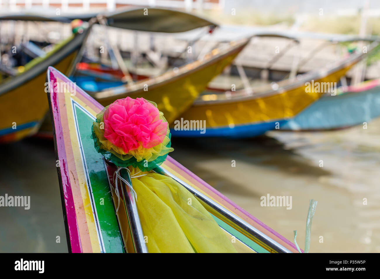 Colorful decorated  wooden boats at Damnoen Saduak Floating Market. Bangkok, Thailand Stock Photo