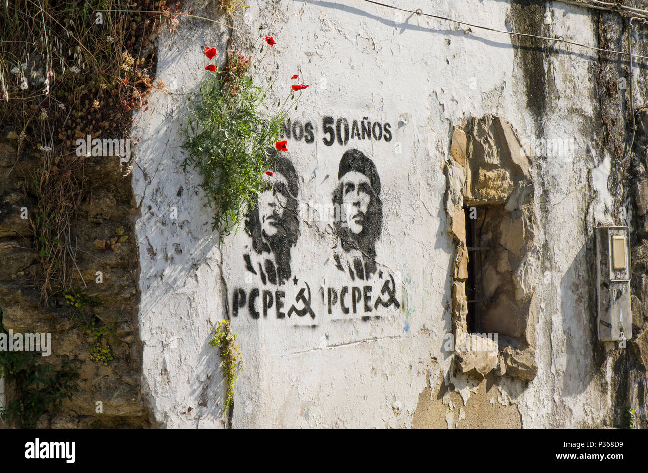 PCPE, andalucia, Signs on wall of communist party of Spain, with che guevara depicted, Andalusia, Spain. Stock Photo