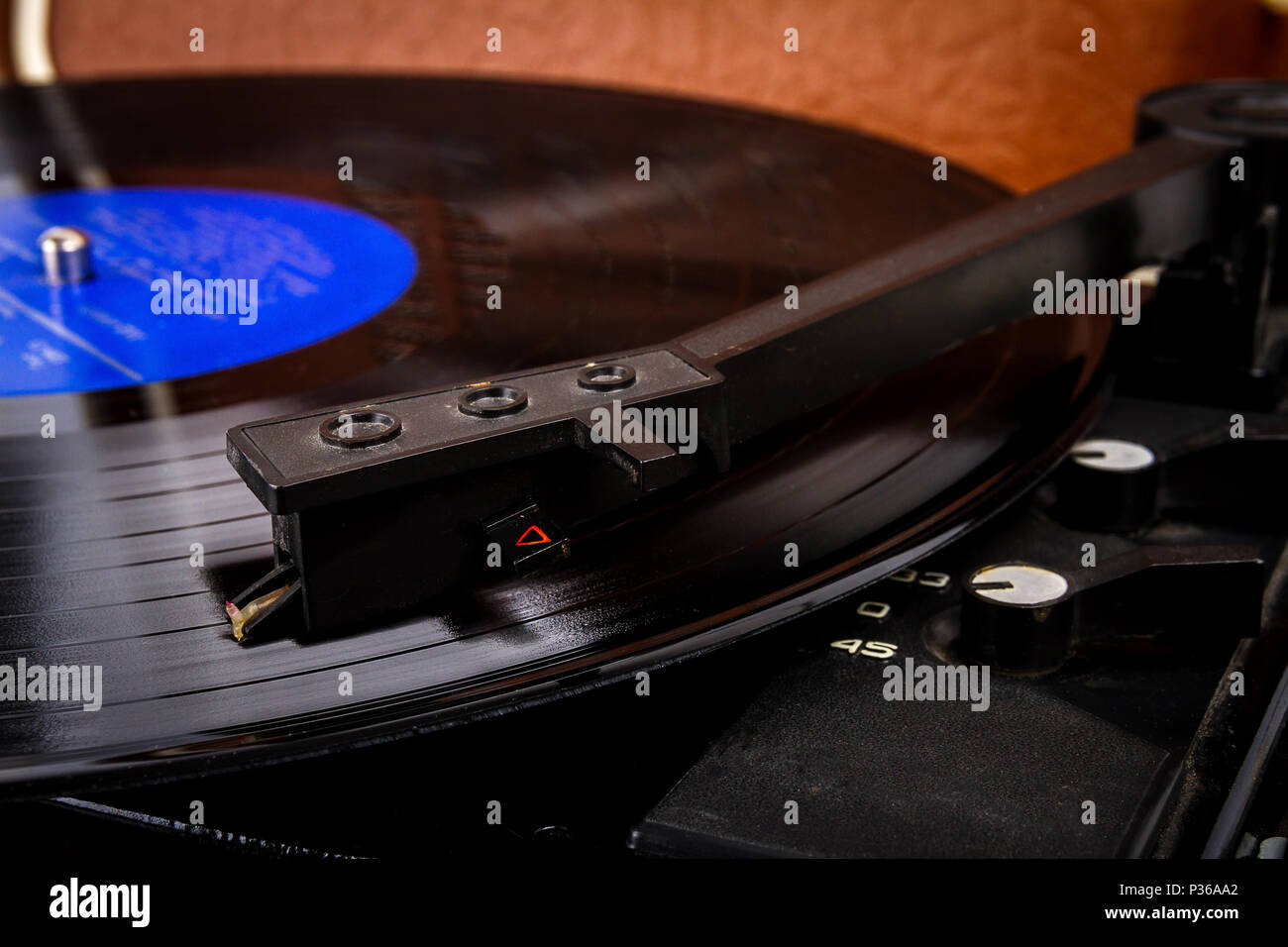 Turntable needle on a vinyl record. Vintage vinyl record player. Needle