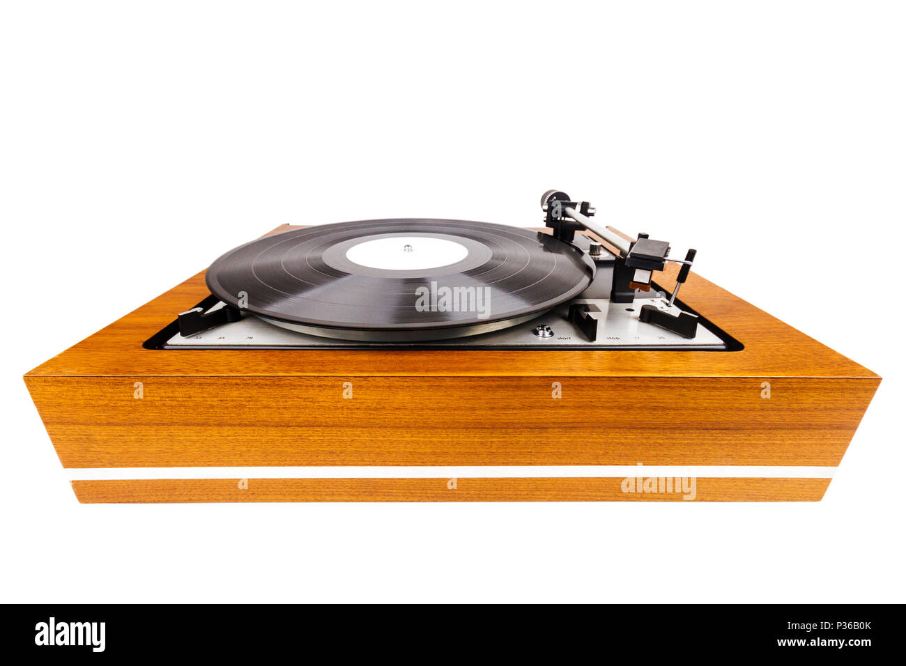 Vintage turntable vinyl record player isolated on white. Wooden plinth ...
