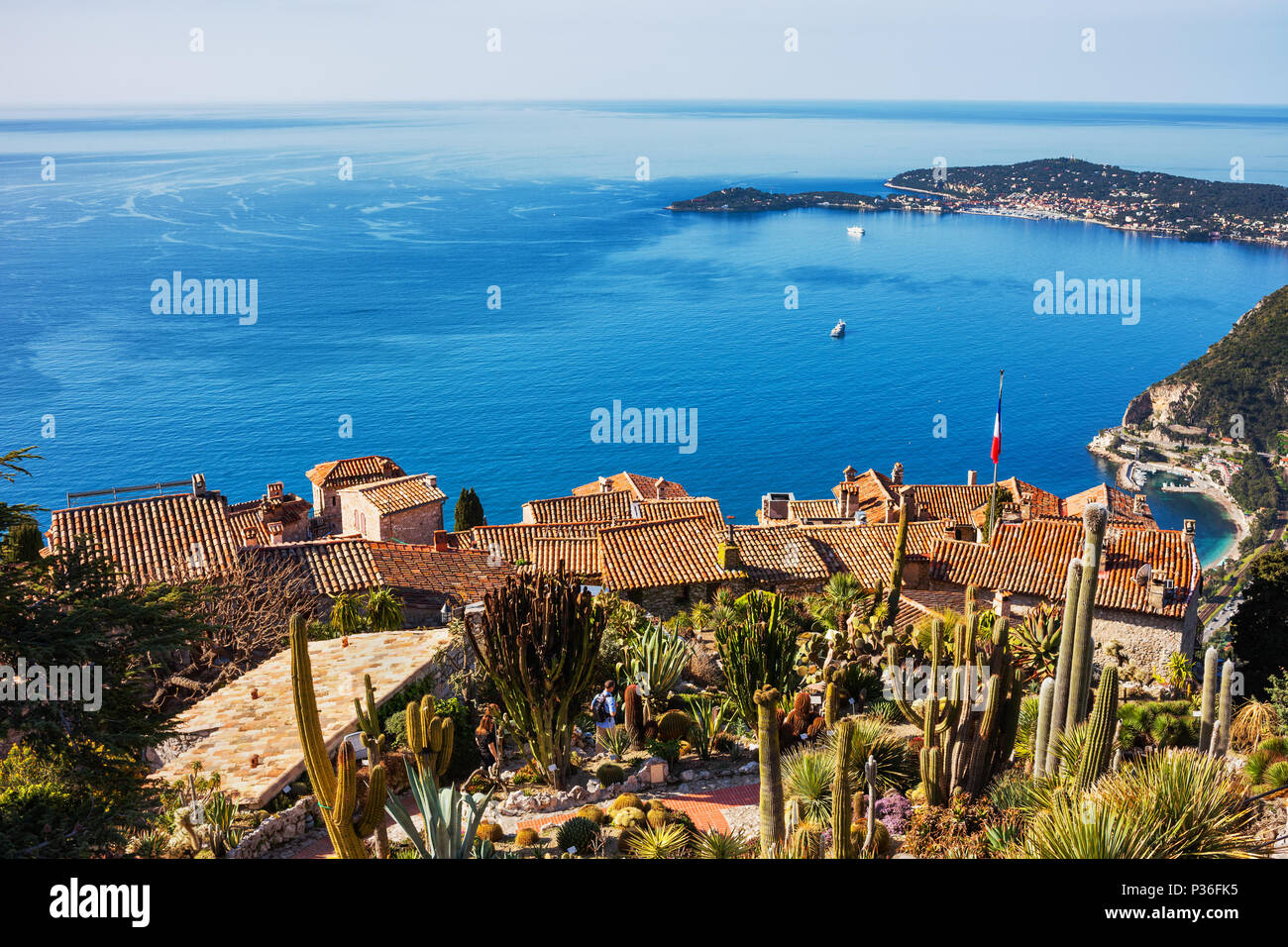 View above Eze village houses and botanical garden to Mediterranean Sea