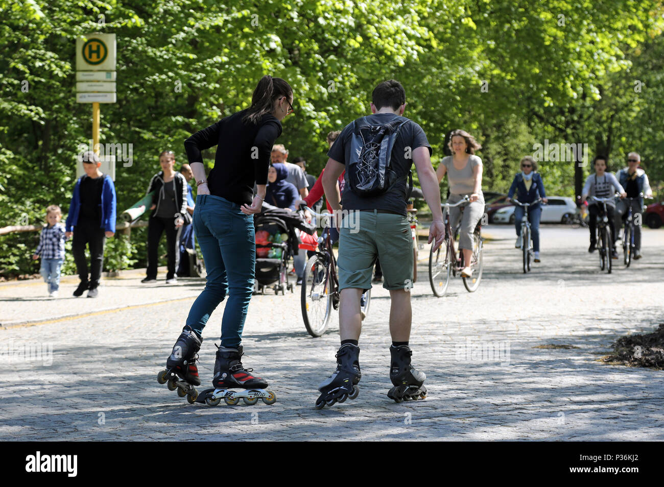 Berlin, Germany, cyclists and inline skaters on a street Stock Photo