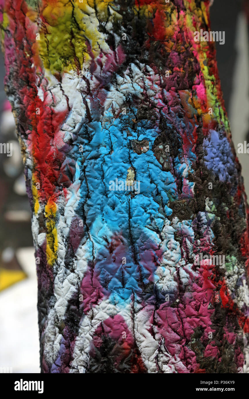 Berlin, Germany, with tree trunk spattered with paint Stock Photo