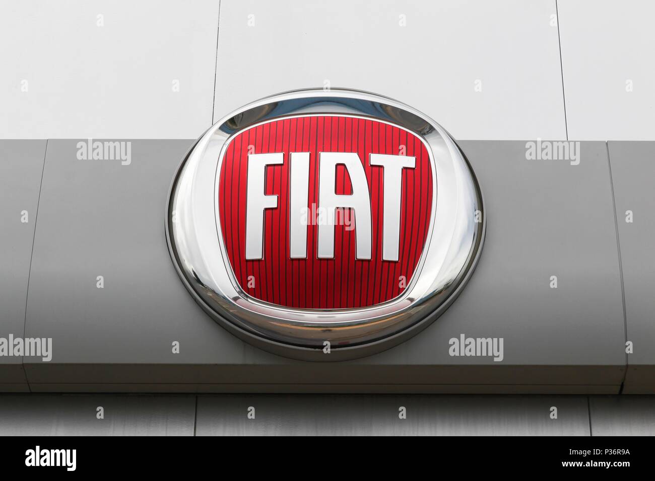 Macon, France - May 27, 2018: Fiat logo on a wall. Fiat Chrysler Automobiles is an Italian-American corporation Stock Photo