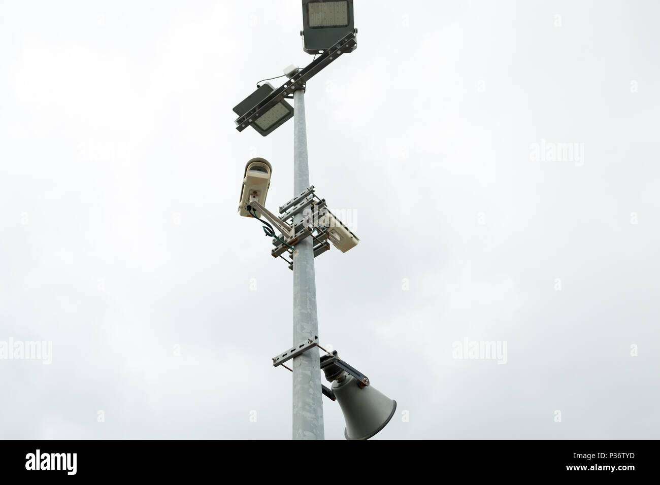 Security CCTV cameras and loudspeaker mounted on the post for street ...