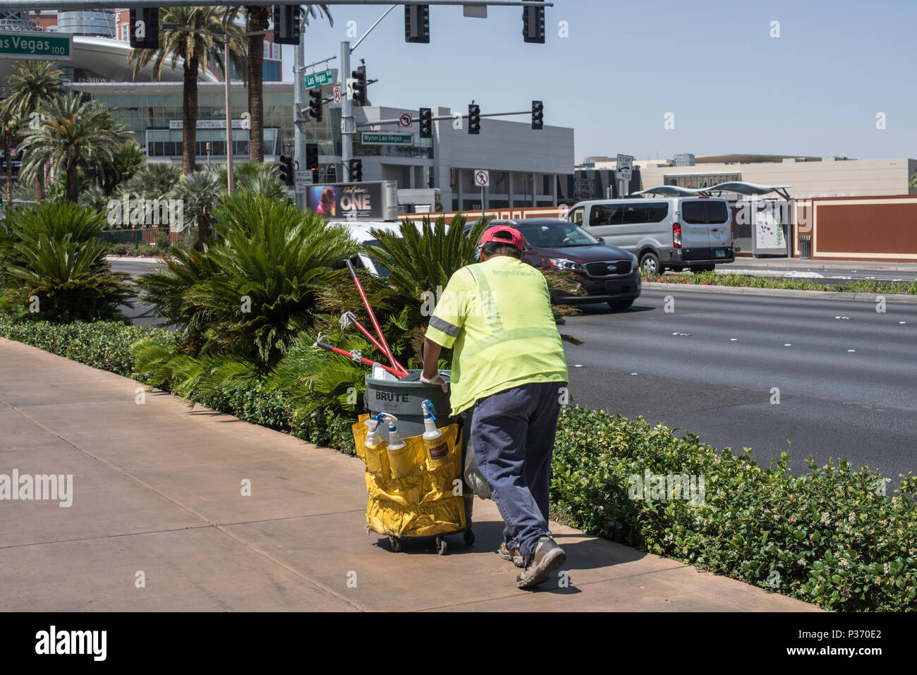 worker picking up litter along the strip in Las Vegas, Nevada, USA