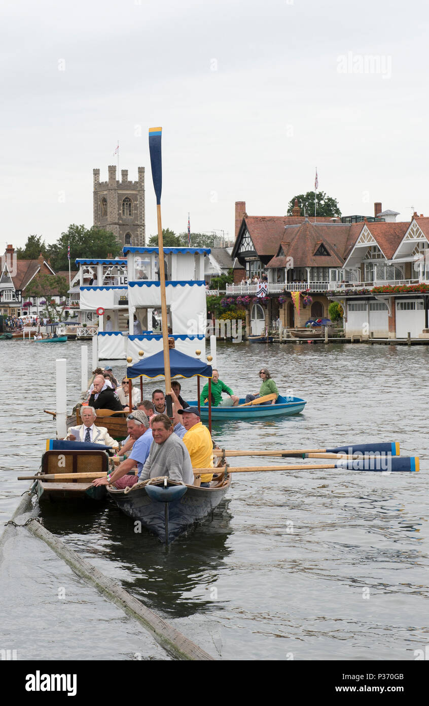 Henley, England. Skiff, tied on the booms to watch the racing. 2015