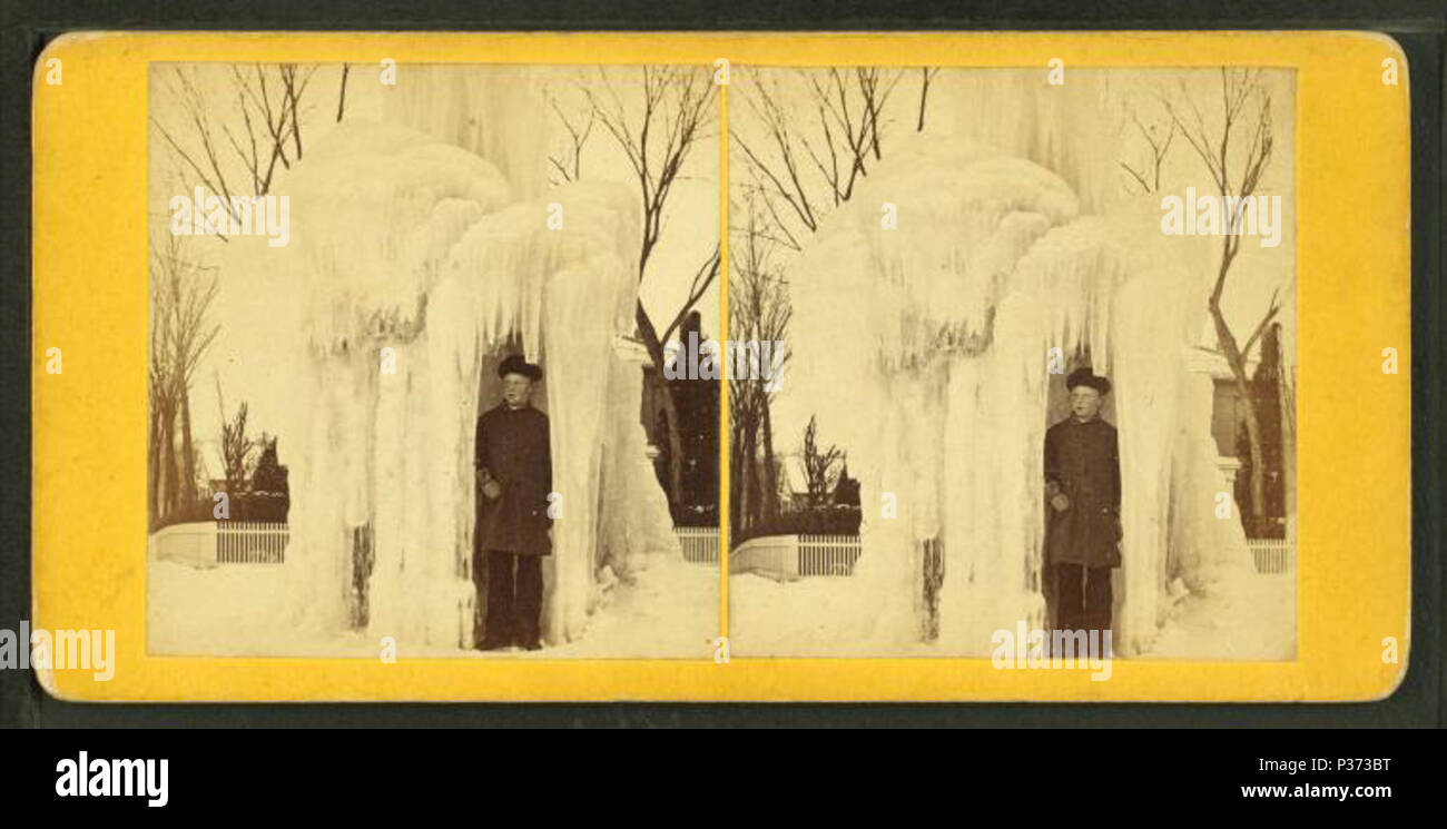 . A boy standing inside a frozen fountain, Chicopee Falls.  Coverage: 1865?-1905?. Source Imprint: 1865?-1905?. Digital item published 6-30-2005; updated 2-12-2009. 10 A boy standing inside a frozen fountain, Chicopee Falls, from Robert N. Dennis collection of stereoscopic views Stock Photo
