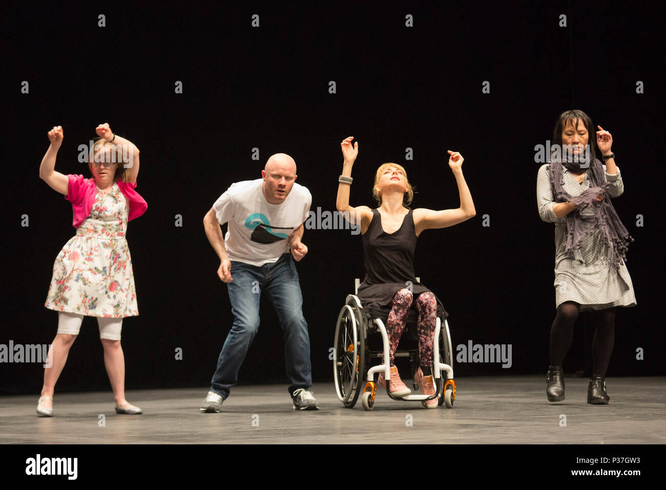 London, UK. 20 March 2015. L-R: Katy Francis, Gary Clarke. Suzie Birchwood and Jia-Yu Corti. Sadler's Wells presents a weekend of inclusive dance from 20 to 22 March 2015. Candoco Dance Company, a contemporary dance comapny of disabled and non-disabled performers presents a restaging of Jerome Bel's award-winning The Show Must Go On. The weekend also includes the final performances of the inaugural year of the Sadler's Wells =dance series, a presentation of inclusive dance by both established and emerging deaf and disabled artists in the Lilian Baylis Studio. Stock Photo