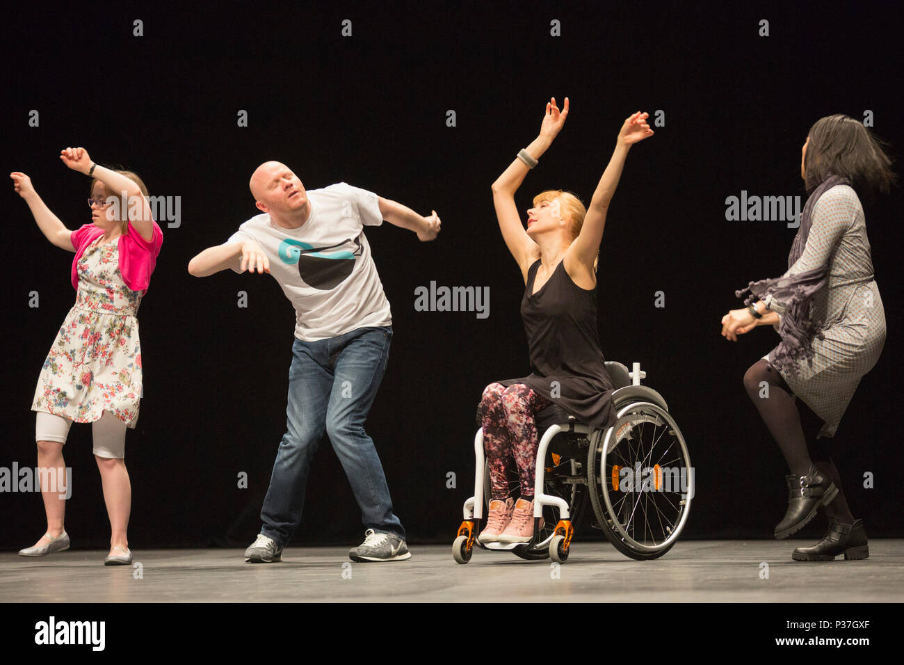 London, UK. 20 March 2015.  L-R: Katy Francis, Gary Clarke. Suzie Birchwood and Jia-Yu Corti. Sadler's Wells presents a weekend of inclusive dance from 20 to 22 March 2015. Candoco Dance Company, a contemporary dance comapny of disabled and non-disabled performers presents a restaging of Jerome Bel's award-winning The Show Must Go On. The weekend also includes the final performances of the inaugural year of the Sadler's Wells =dance series, a presentation of inclusive dance by both established and emerging deaf and disabled artists in the Lilian Baylis Studio. Stock Photo