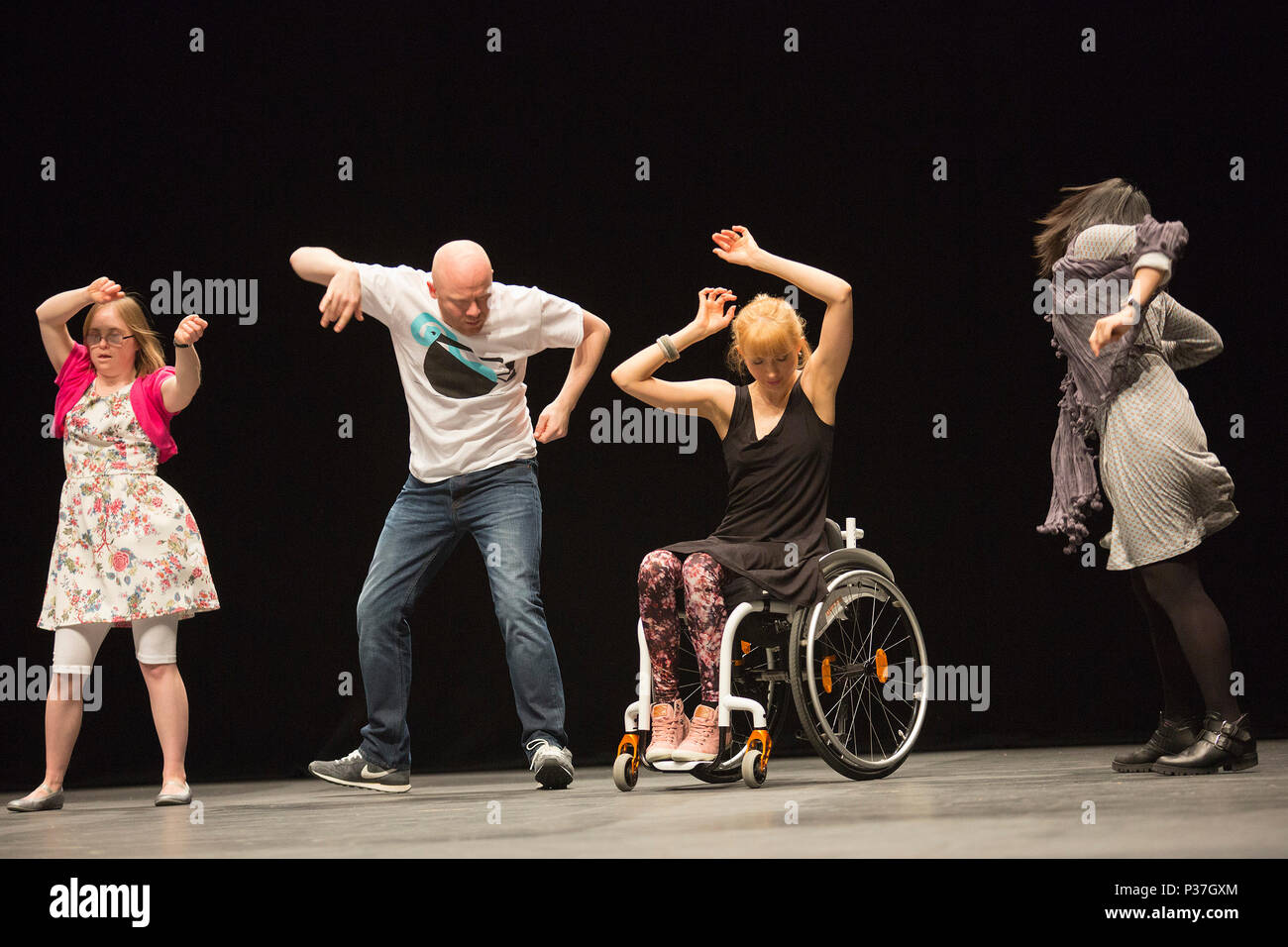 London, UK. 20 March 2015.  L-R: Katy Francis, Gary Clarke. Suzie Birchwood and Jia-Yu Corti. Sadler's Wells presents a weekend of inclusive dance from 20 to 22 March 2015. Candoco Dance Company, a contemporary dance comapny of disabled and non-disabled performers presents a restaging of Jerome Bel's award-winning The Show Must Go On. The weekend also includes the final performances of the inaugural year of the Sadler's Wells =dance series, a presentation of inclusive dance by both established and emerging deaf and disabled artists in the Lilian Baylis Studio. Stock Photo