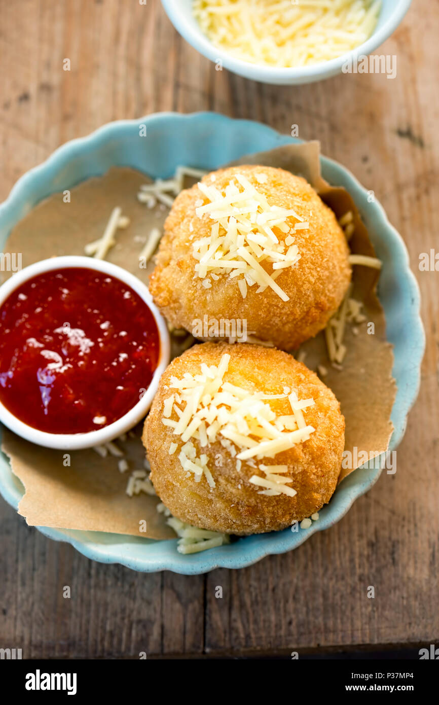 Cheddar cheese bombs with pasta filling & chilli jam Stock Photo Alamy