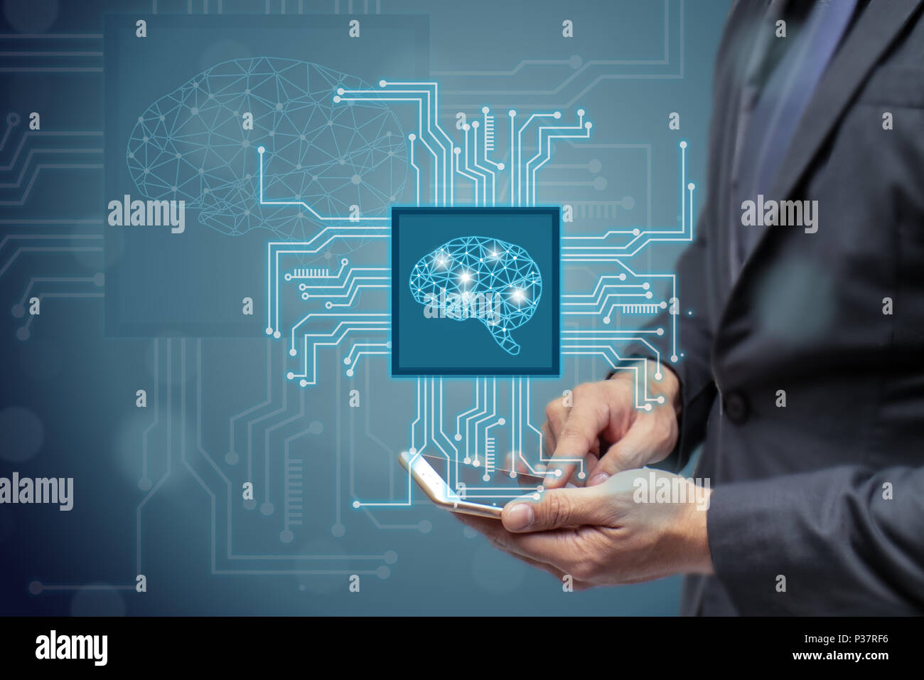 business man or engineer use ai or artificial intelligent concept,Cloud computing, data mining, machine learning, neural networks to monitor, research Stock Photo