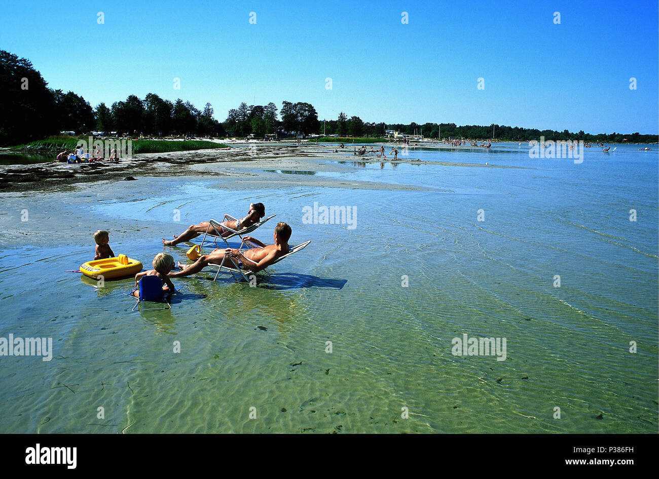Boeda, Sweden, Badegaeste on the beach Stock Photo