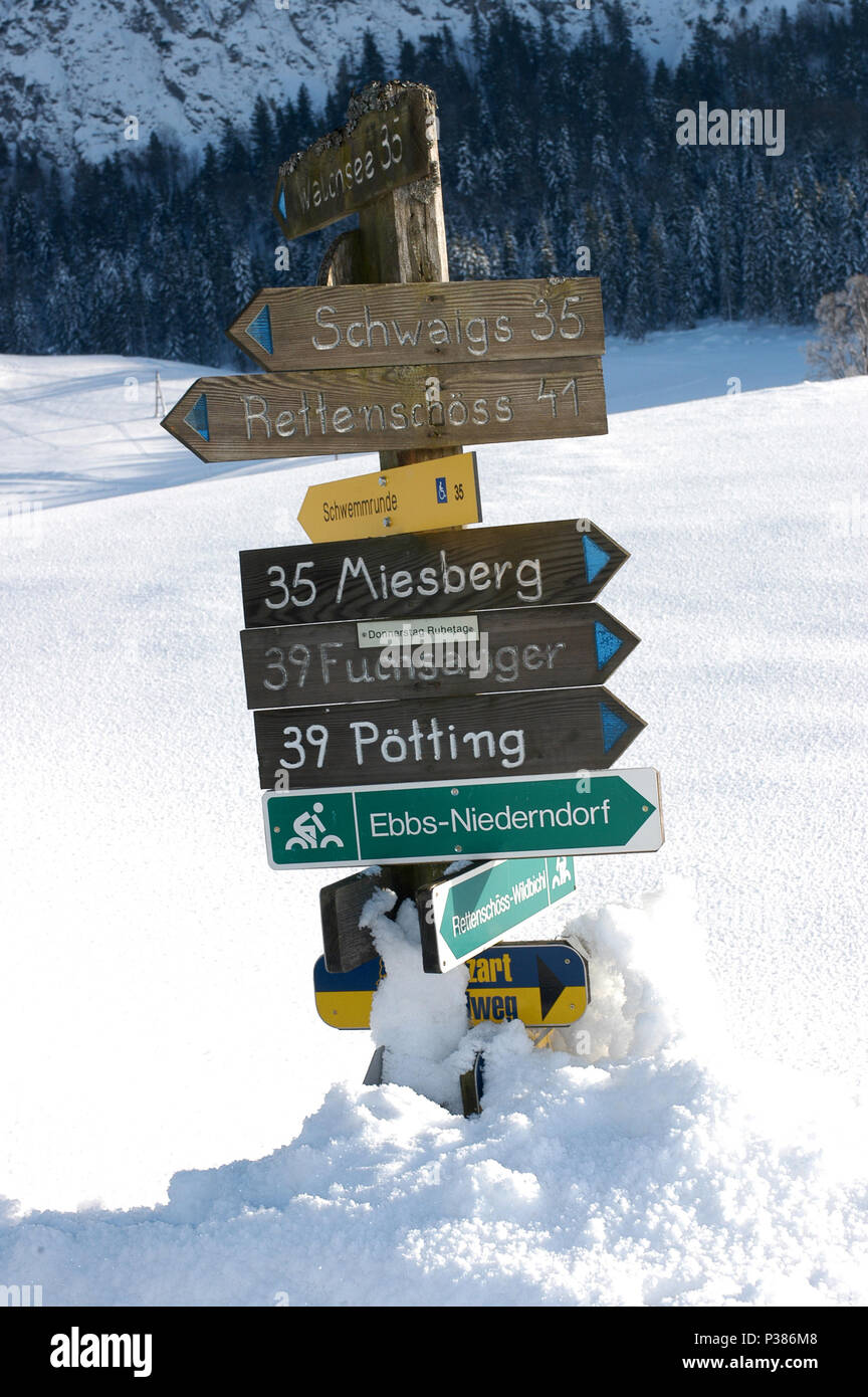 Walchsee, Austria, snowy signpost in Kaiserwinkl Stock Photo