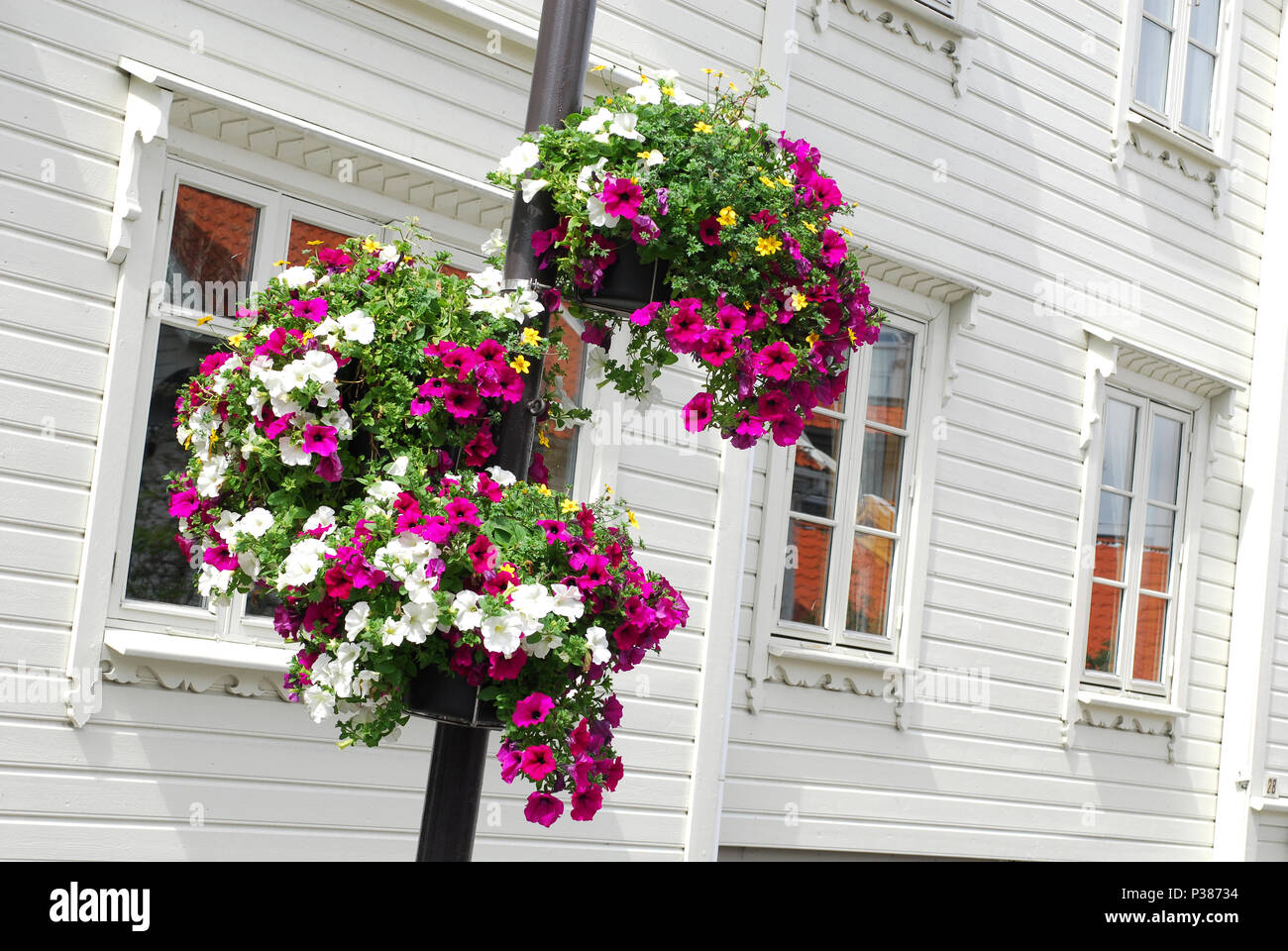 Egersund, Norway, flowers on a street lamp in the center of Egersund Stock Photo