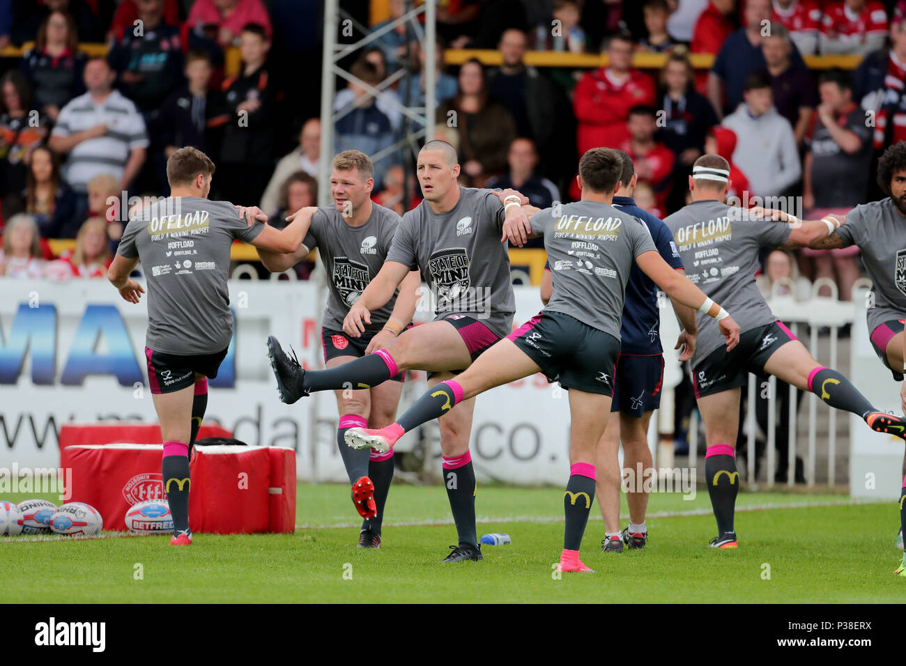 Hull KR players warm up with Offload state of mind tshirts during the Betfred Super League match at the Mend-A-Hose Jungle, Casteford. Stock Photo