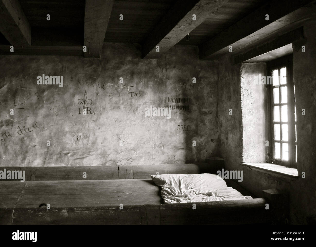 In the fortress Monotone Image Window and bed Stock Photo - Alamy