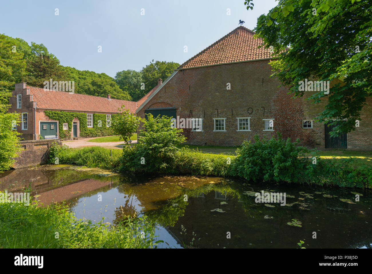Moated castle  Castle Hinta, former seat of an East Frisian chieftain,  Hinte, East Frisia, Lower Saxony, Germany Stock Photo