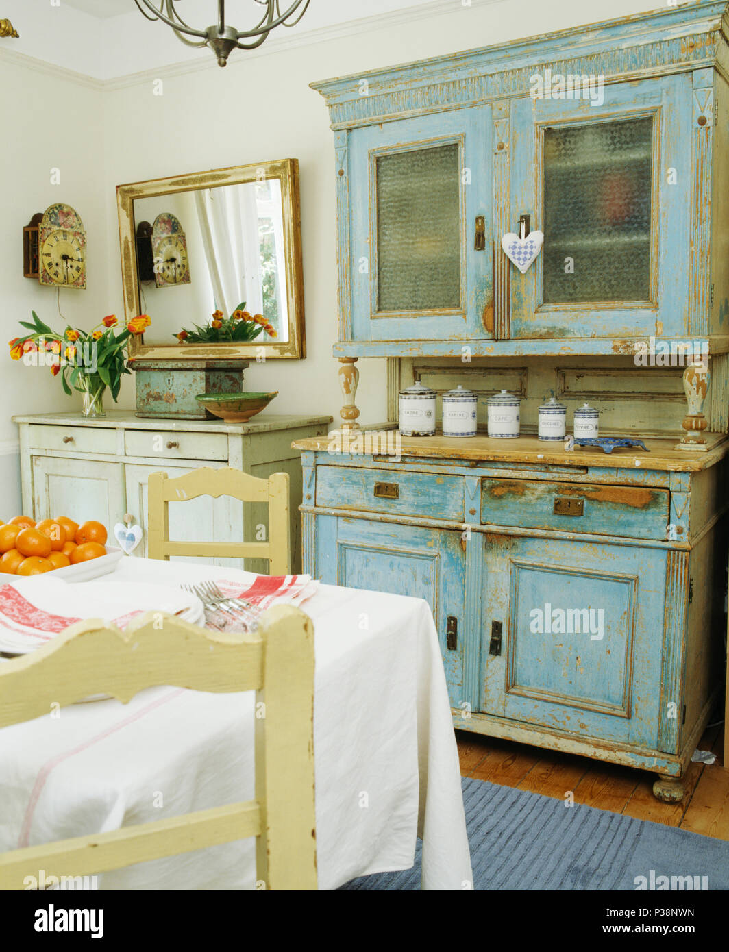 Pale Blue Painted Dresser In Country Dining Room With White Linen