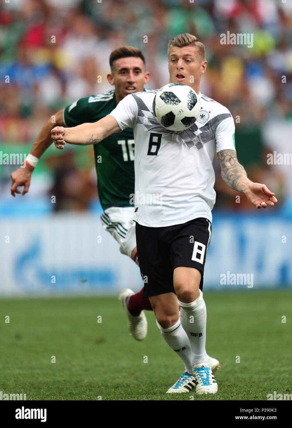 Hector Herrera & Toni Kroos GERMANY V MEXICO GERMANY V MEXICO, 2018 FIFA WORLD CUP RUSSIA 17 June 2018 GBC8277 2018 FIFA World Cup Russia STRICTLY EDITORIAL USE ONLY. If The Player/Players Depicted In This Image Is/Are Playing For An English Club Or The England National Team. Then This Image May Only Be Used For Editorial Purposes. No Commercial Use. The Following Usages Are Also Restricted EVEN IF IN AN EDITORIAL CONTEXT: Use in conjuction with, or part of, any unauthorized audio, video, data, fixture lists, club/league logos, Betting, Games or any 'live' services. Also R Stock Photo