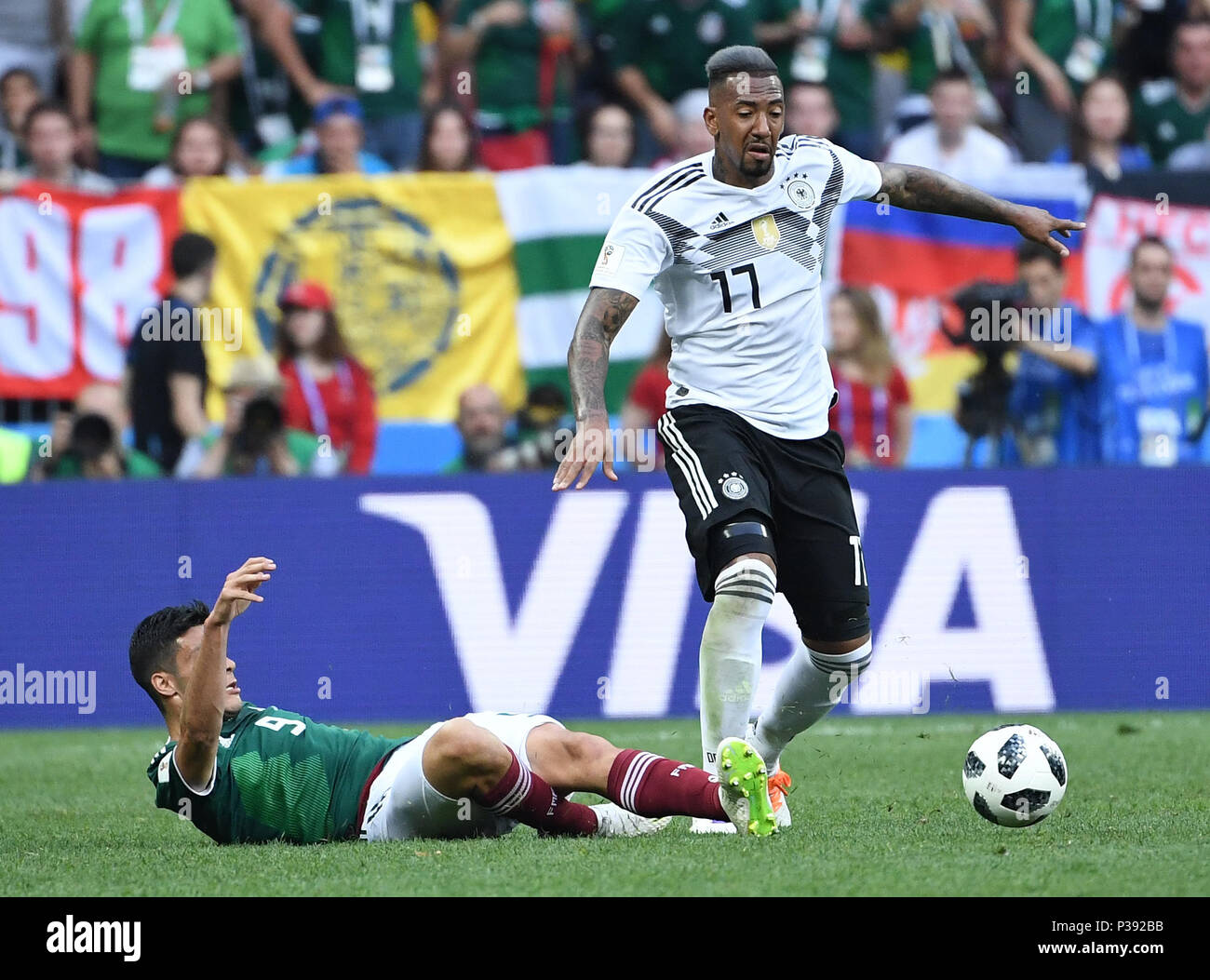 Moscow, Russland. 17th June, 2018. duels, duel Jerome Boateng (Germany) versus Raul Jimenez (Mexico)/l. GES/Football/World Cup 2018 Russia: Germany - Mexico, 17.06.2018 GES/Soccer/Football/Worldcup 2018 Russia: Gemany vs Mexico, Moscow, June 17, 2018 | usage worldwide Credit: dpa/Alamy Live News Stock Photo