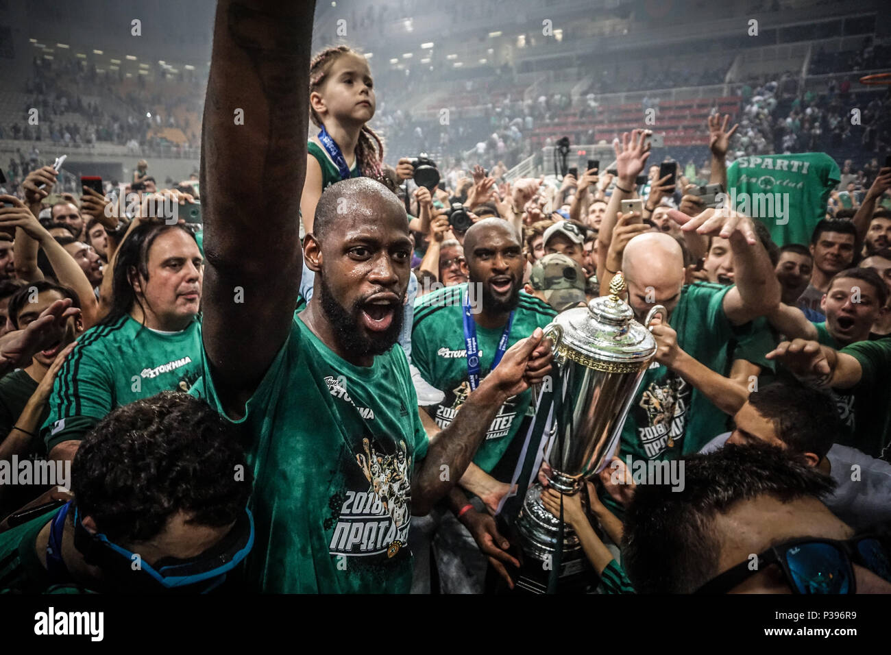 James Gist of Panathinaikos superfoods and supporter celebrate the Greek  championship after winning the fifth and final play-off game of the Greek  Basketball league finals against Olympiacos BC. (Final score 84-70 Stock