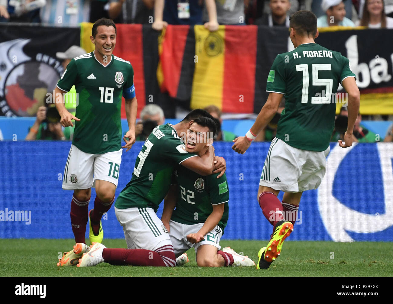 17 June 2018, Russia, Moscow, Soccer, FIFA World Cup, Group F, Matchday 1 of 3, Germany vs Mexico at the Luzhniki Stadium: Hirving Lozano of Mexico cheers over his 1-0 score with Jesus Gallardo (C), Andres Guardado (L) and Hector Moreno. Photo: Ina Fassbender/dpa Stock Photo