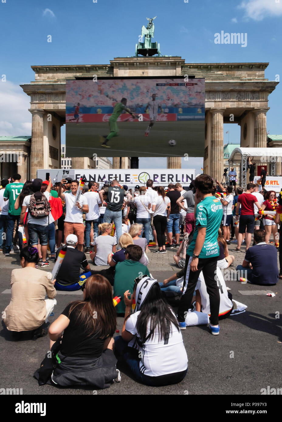 Berlin, Germany.. 17th June 2018. World Cup Football 2018.  Fans gather to watch the matches on giant screens placed along the Strasse on 17th June. The viewing area stretches for nearly two kilometres and the gigantic fan fest is known as the Fanmeile. Credit: Eden Breitz/Alamy Live News Stock Photo