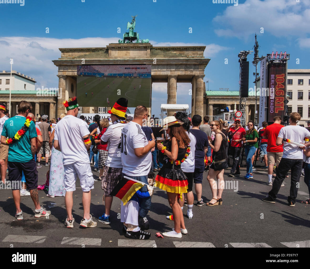 Berlin, Germany.. 17th June 2018. World Cup Football 2018.  Fans gather to watch the matches on giant screens placed along the Strasse on 17th June. The viewing area stretches for nearly two kilometres and the gigantic fan fest is known as the Fanmeile. Credit: Eden Breitz/Alamy Live News Stock Photo