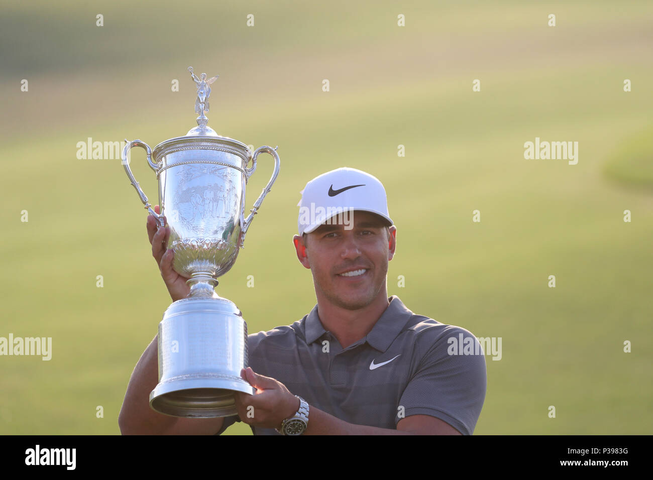 Brooks Koepka of USA celebrates with the trophy after winning the final round of the 118th U.S. Open Championship at the Shinnecock Hills Golf Club in Southampton, New York, United States, on June 16, 2018. (Photo by Koji Aoki/AFLO SPORT) Stock Photo