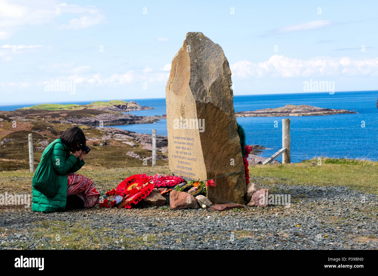 Mourner at Russian Convoy memorial Cove Scotland Stock Photo