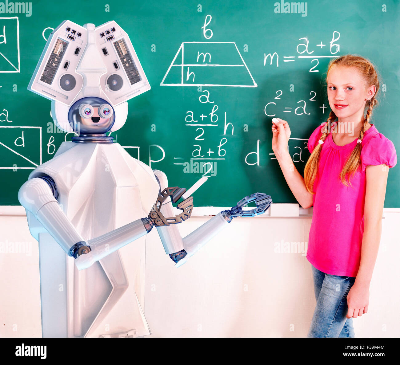 School child and ai android robot writting on blackboard in classroom. Stock Photo