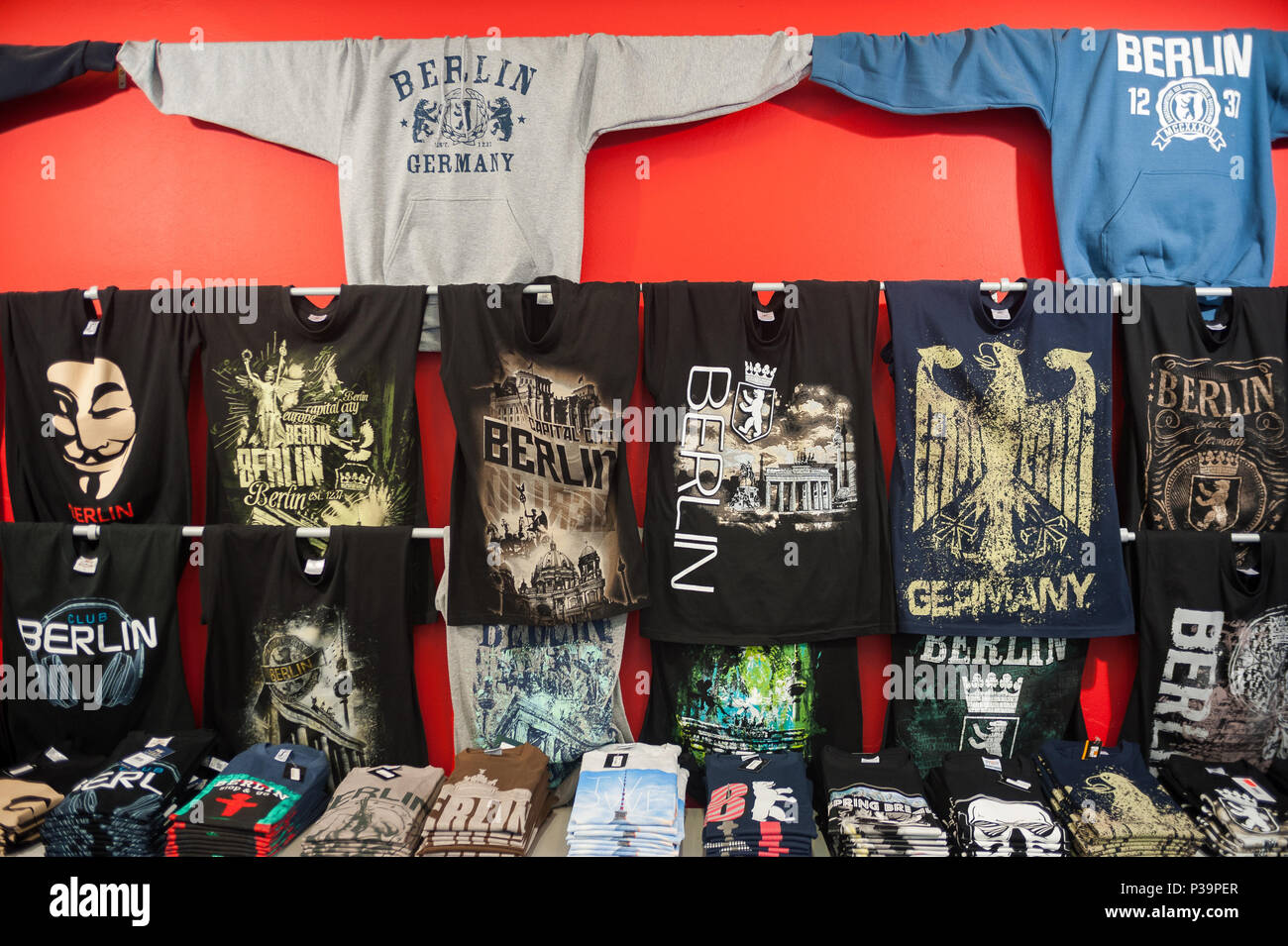 Berlin, Germany, T-shirts and sweaters in a souvenir shop Stock Photo -  Alamy