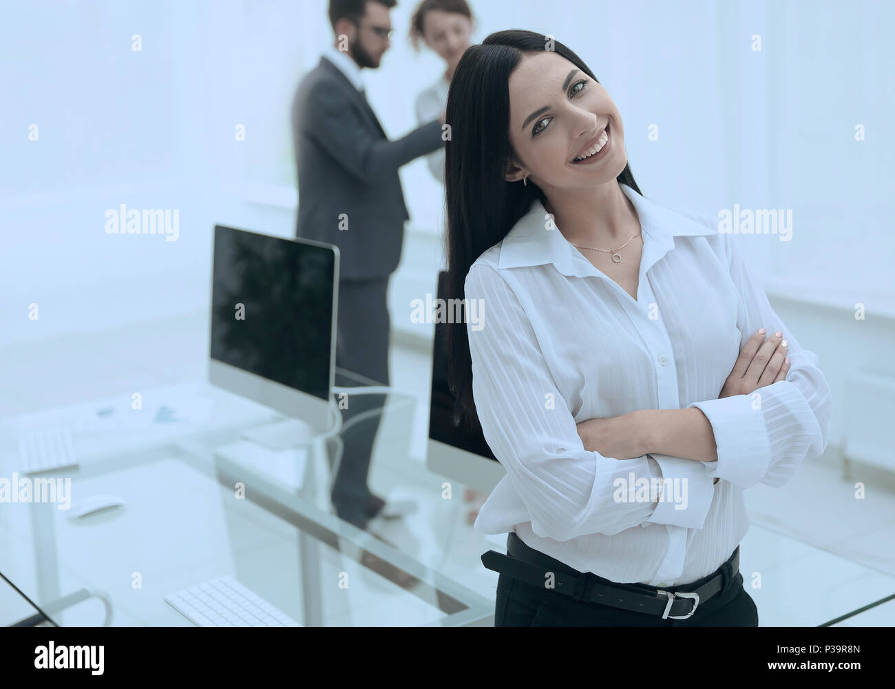 successful young business woman on the background of a workplace Stock ...