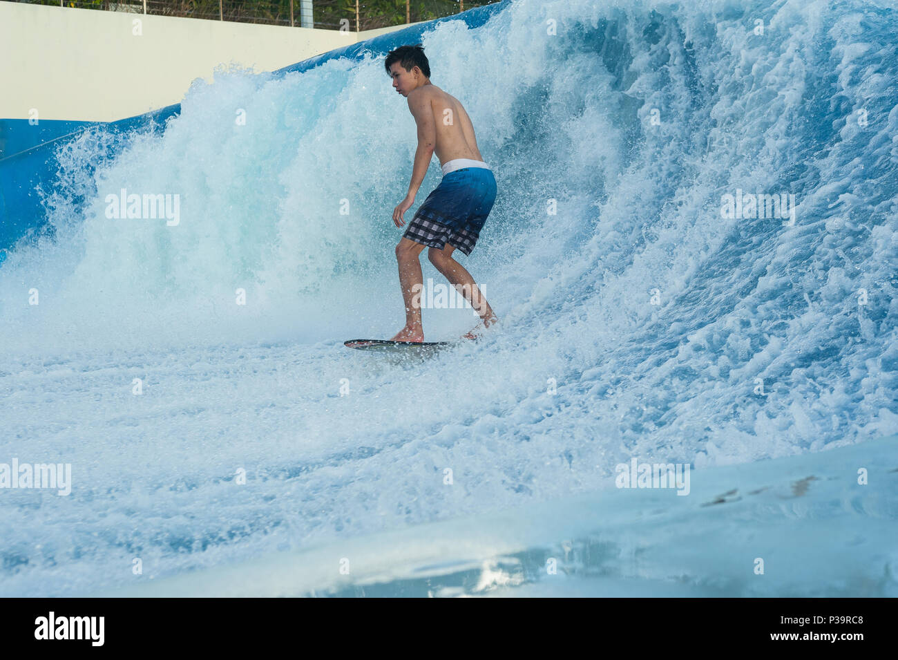 Singapore, Republic of Singapore, surfing at Wave House on Sentosa