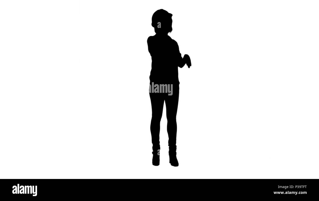 Silhouette Young attractive asian engineer woman standing having a phone call track matte Stock Photo