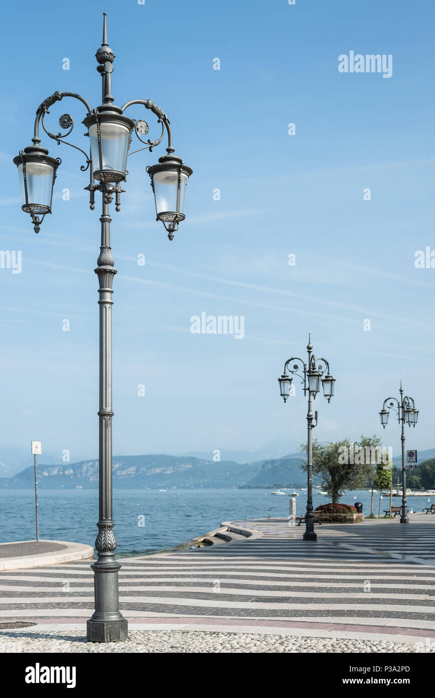 Lazise,   Italy, lanterns on the waterfront Stock Photo