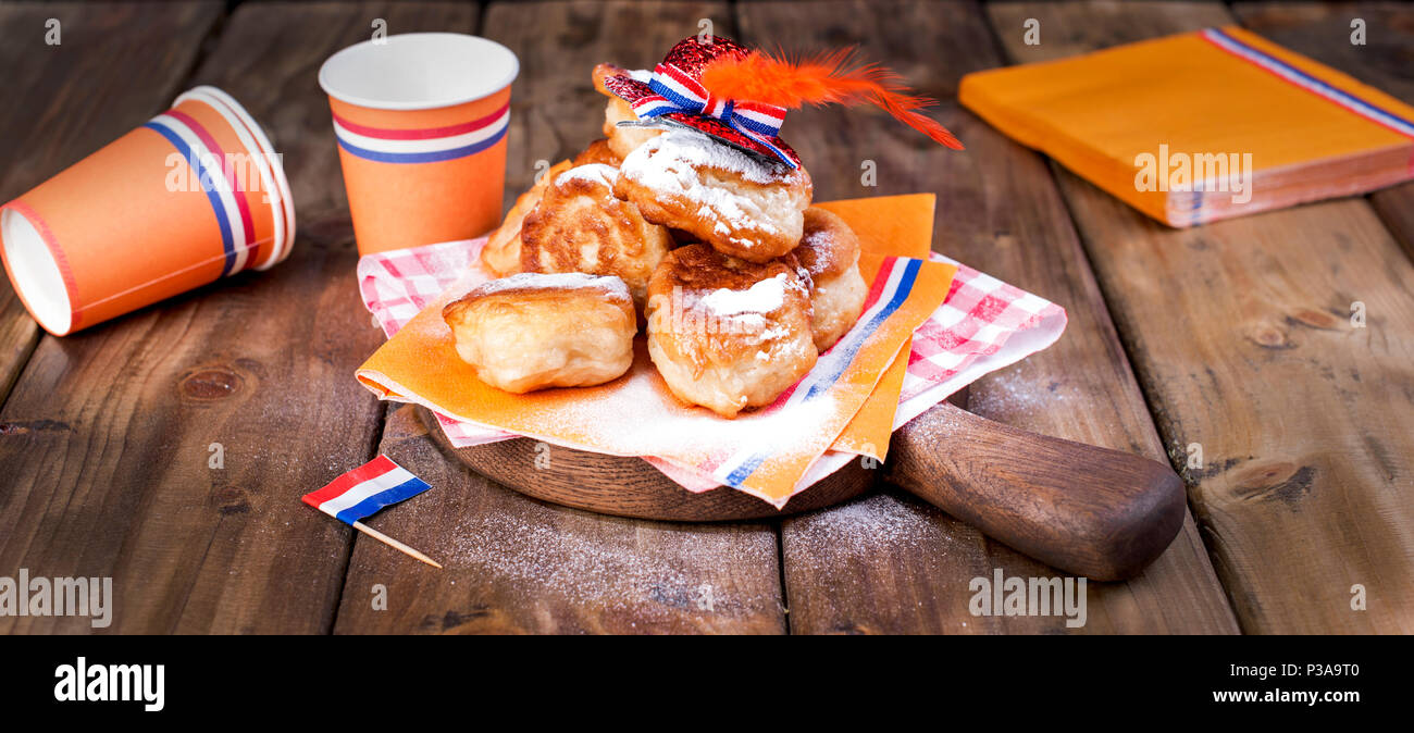 Traditional Dutch sweet pastries. Feast day of the King. Decor. Orange