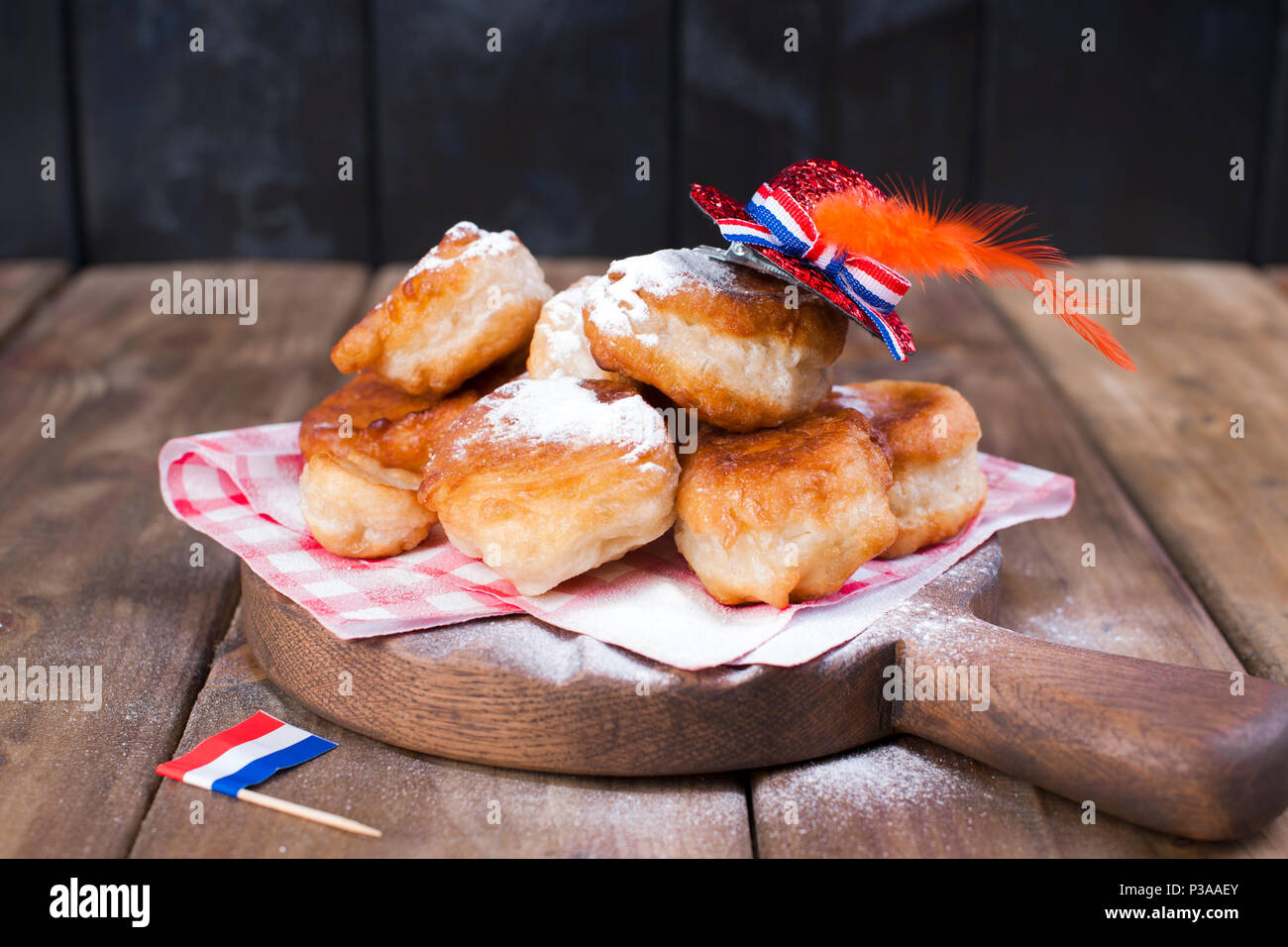 Traditional Dutch sweet pastries. Feast day of the King. Decor. Orange