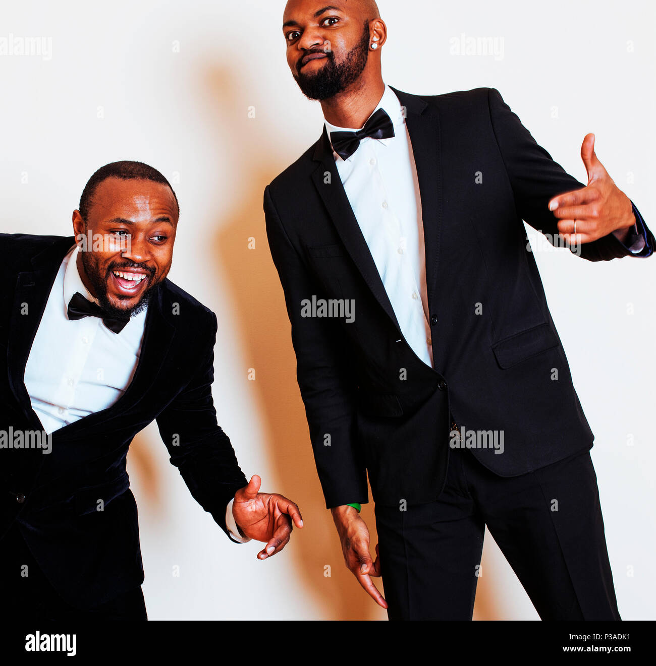 two afro-american businessmen in black suits emotional posing, g Stock ...